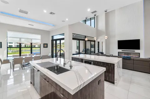 a view of walk in closet with clothes