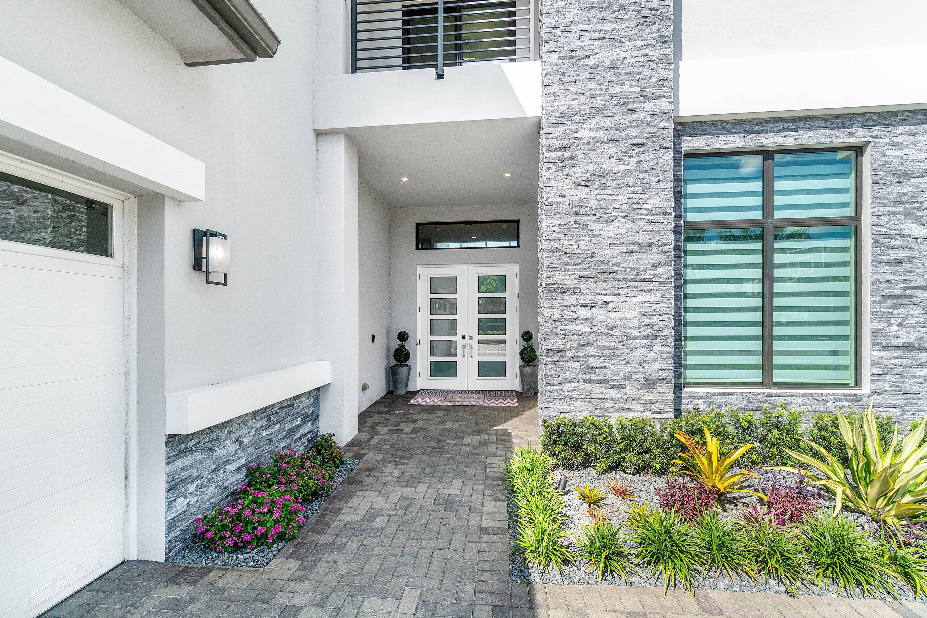 9657 Vescovato Way Boca Raton, FL 33496 - Photo 3 of 68 a front view of a house