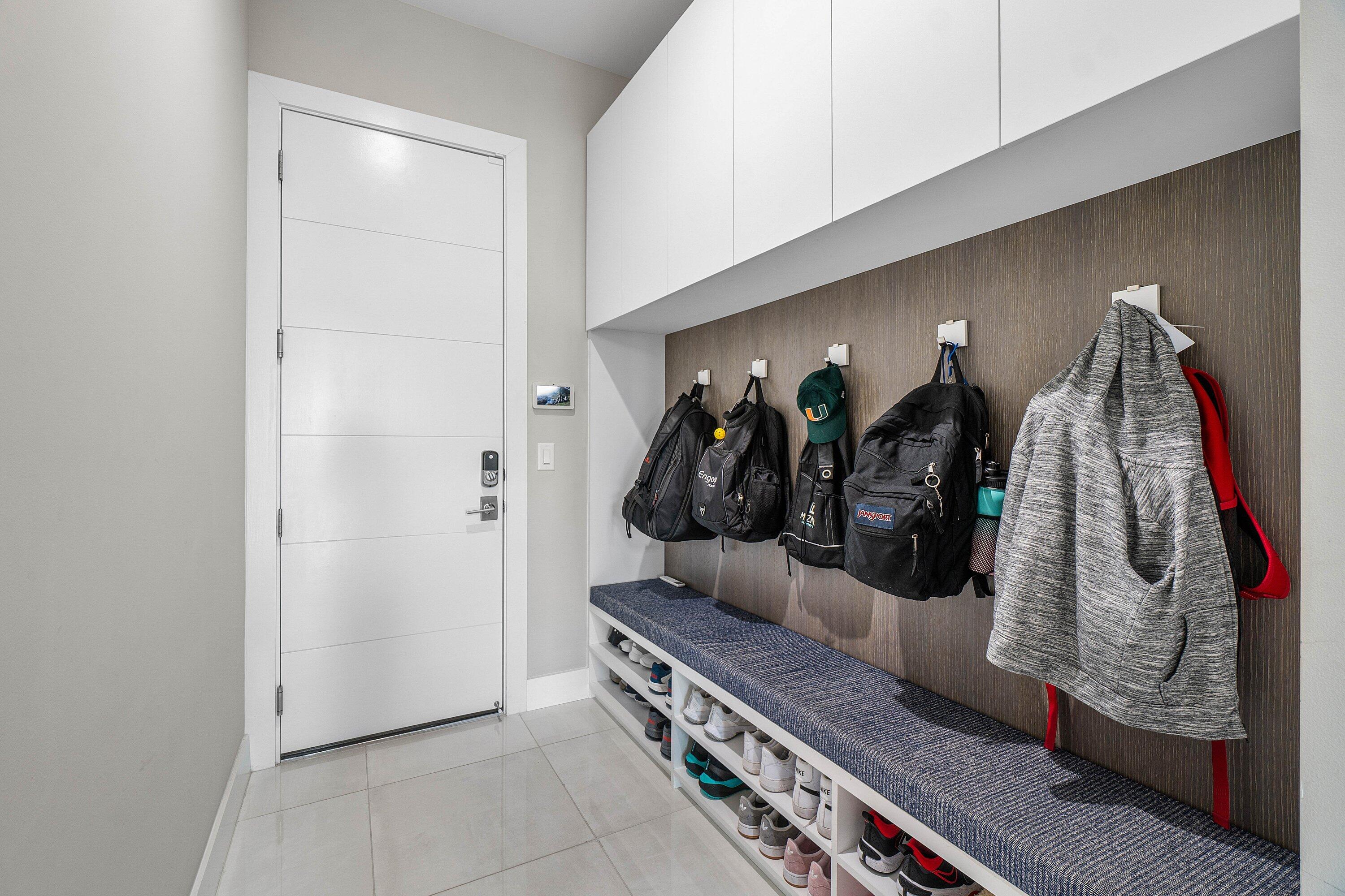 9657 Vescovato Way Boca Raton, FL 33496 - Photo 32 of 68 a view of walk in closet with clothes and shoes