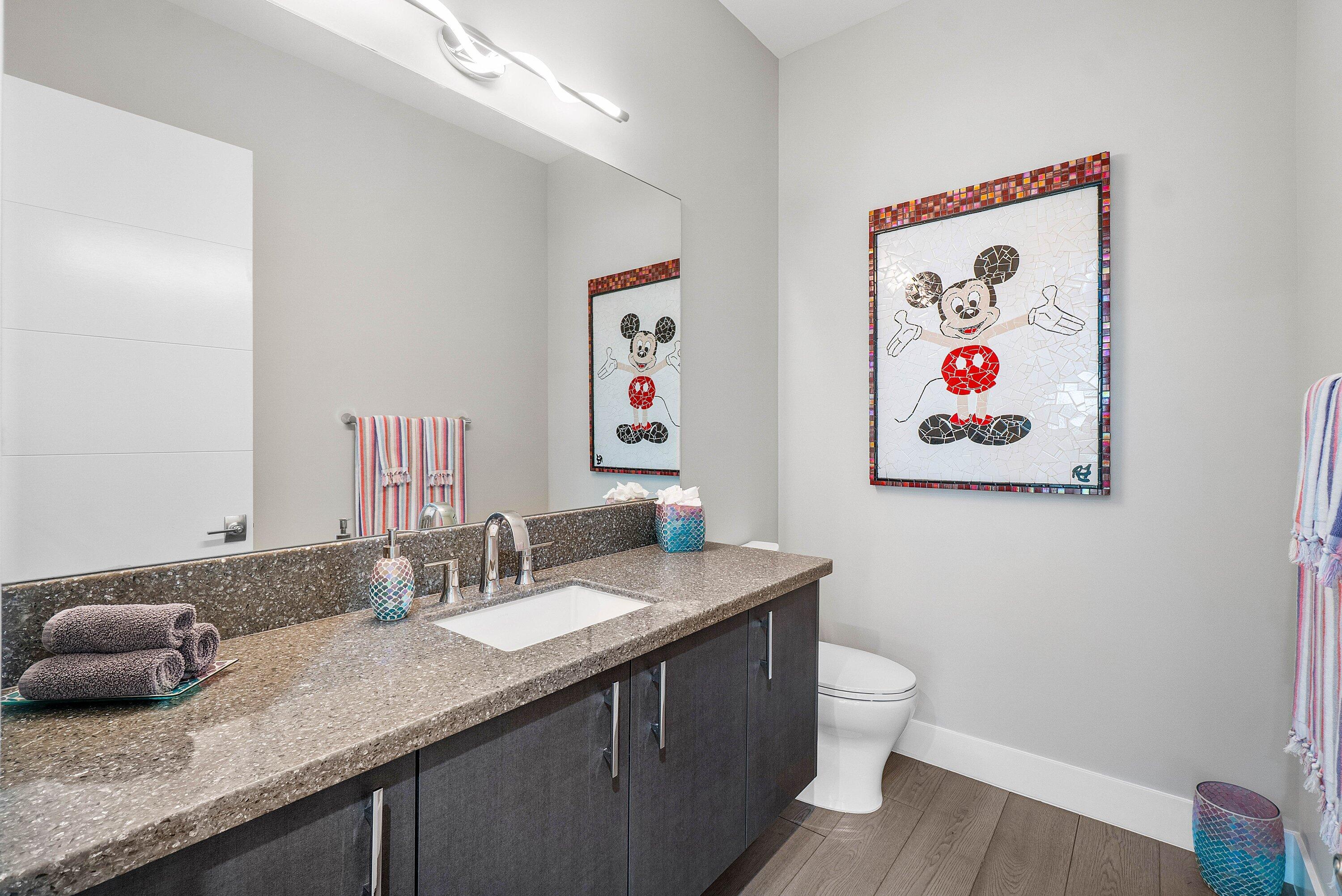 9657 Vescovato Way Boca Raton, FL 33496 - Photo 38 of 68 a bathroom with a granite countertop sink and a mirror