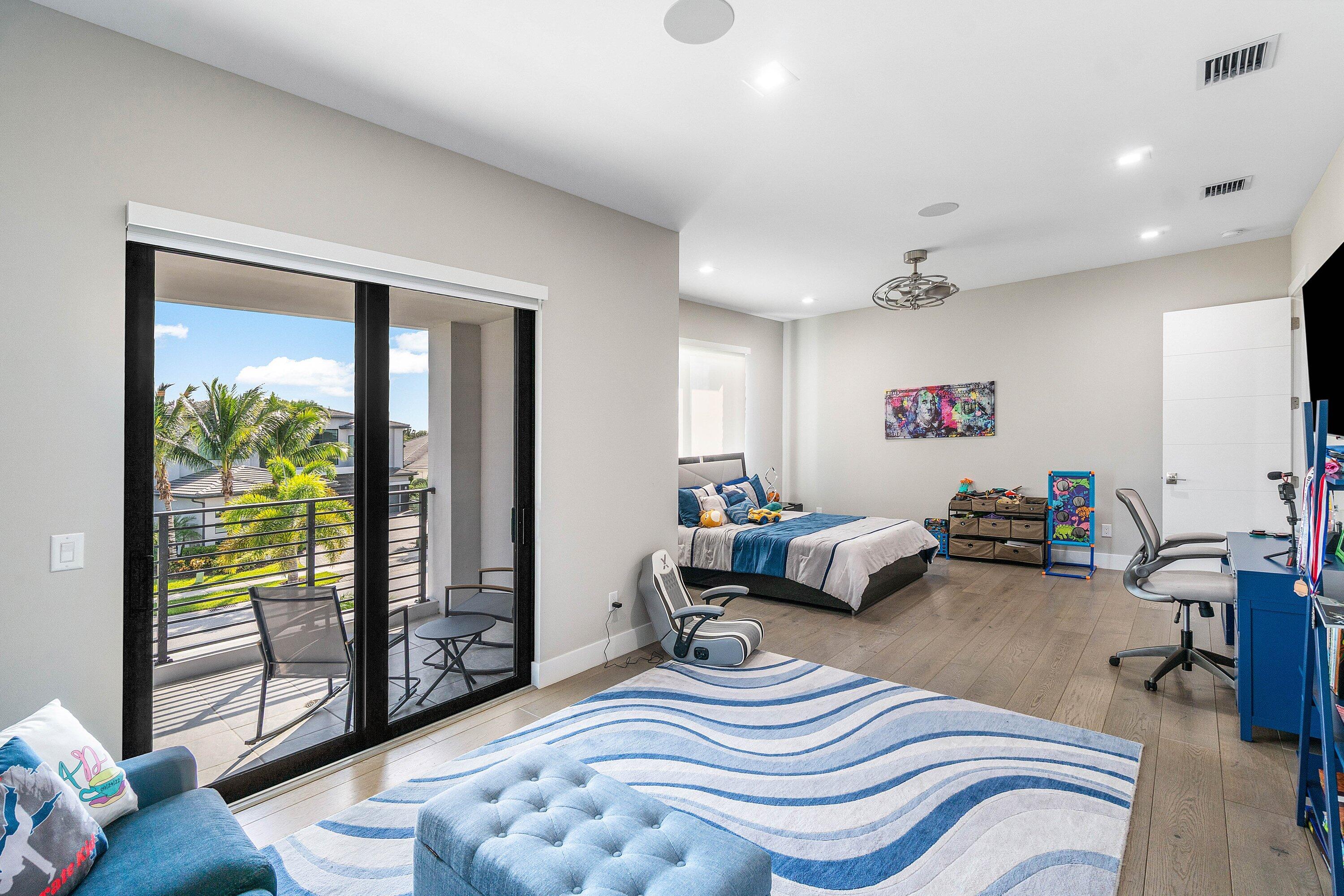 9657 Vescovato Way Boca Raton, FL 33496 - Photo 40 of 68 a bedroom with furniture and a floor to ceiling window