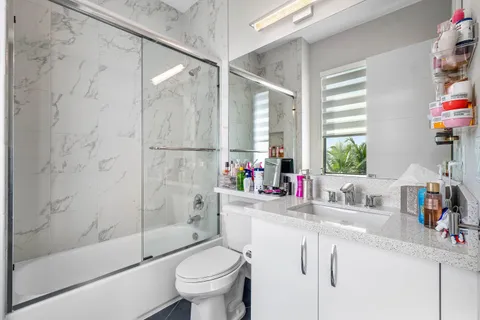 a view of swimming pool with lounge chair