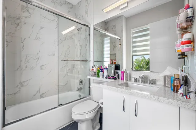 a view of swimming pool with lounge chair