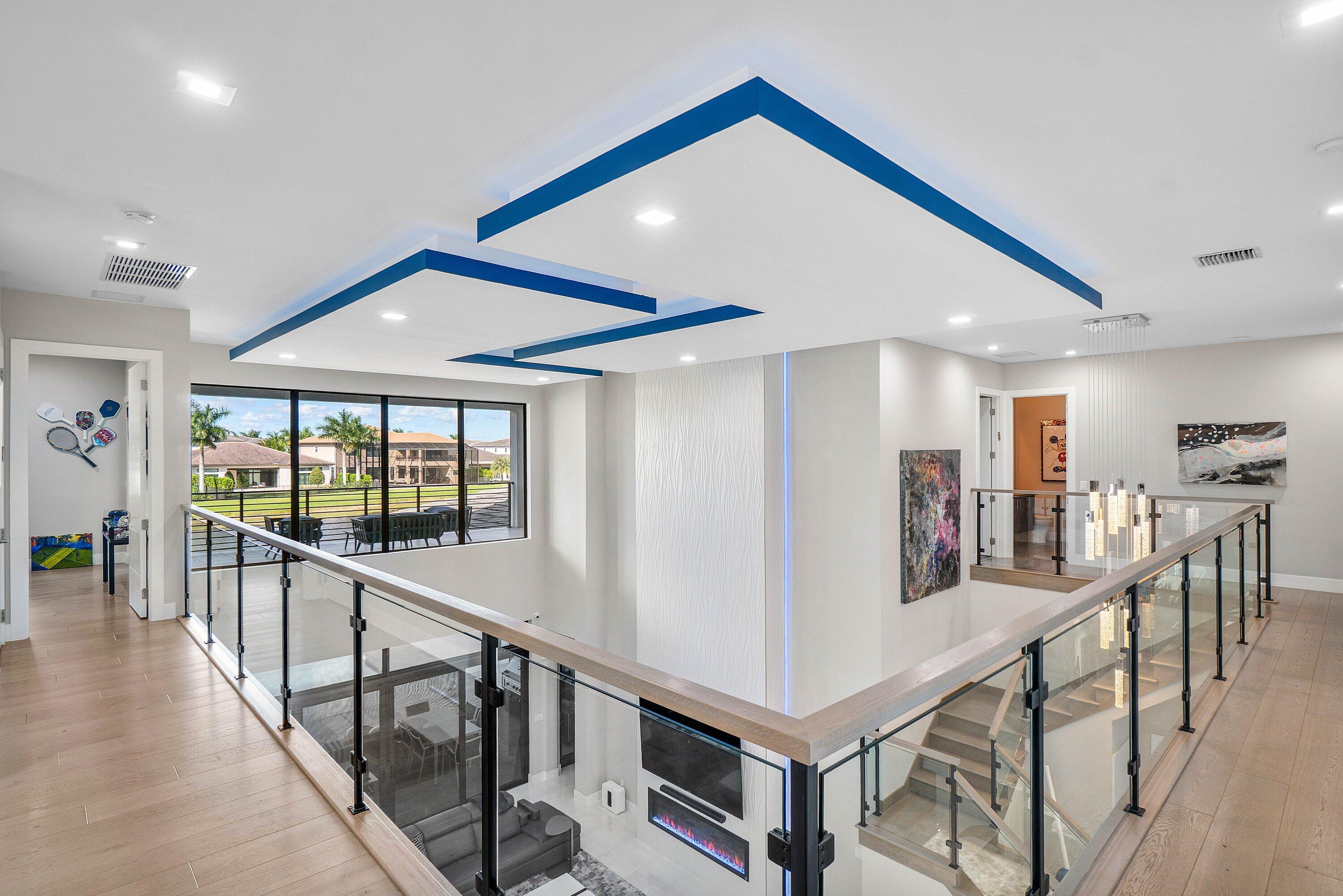 9657 Vescovato Way Boca Raton, FL 33496 - Photo 46 of 68 a view of a hallway with an entryway and stairs