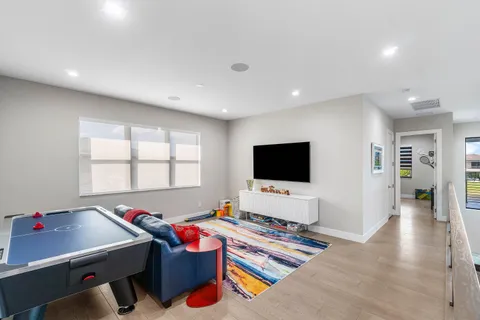 a view of a swimming pool and lounge chair