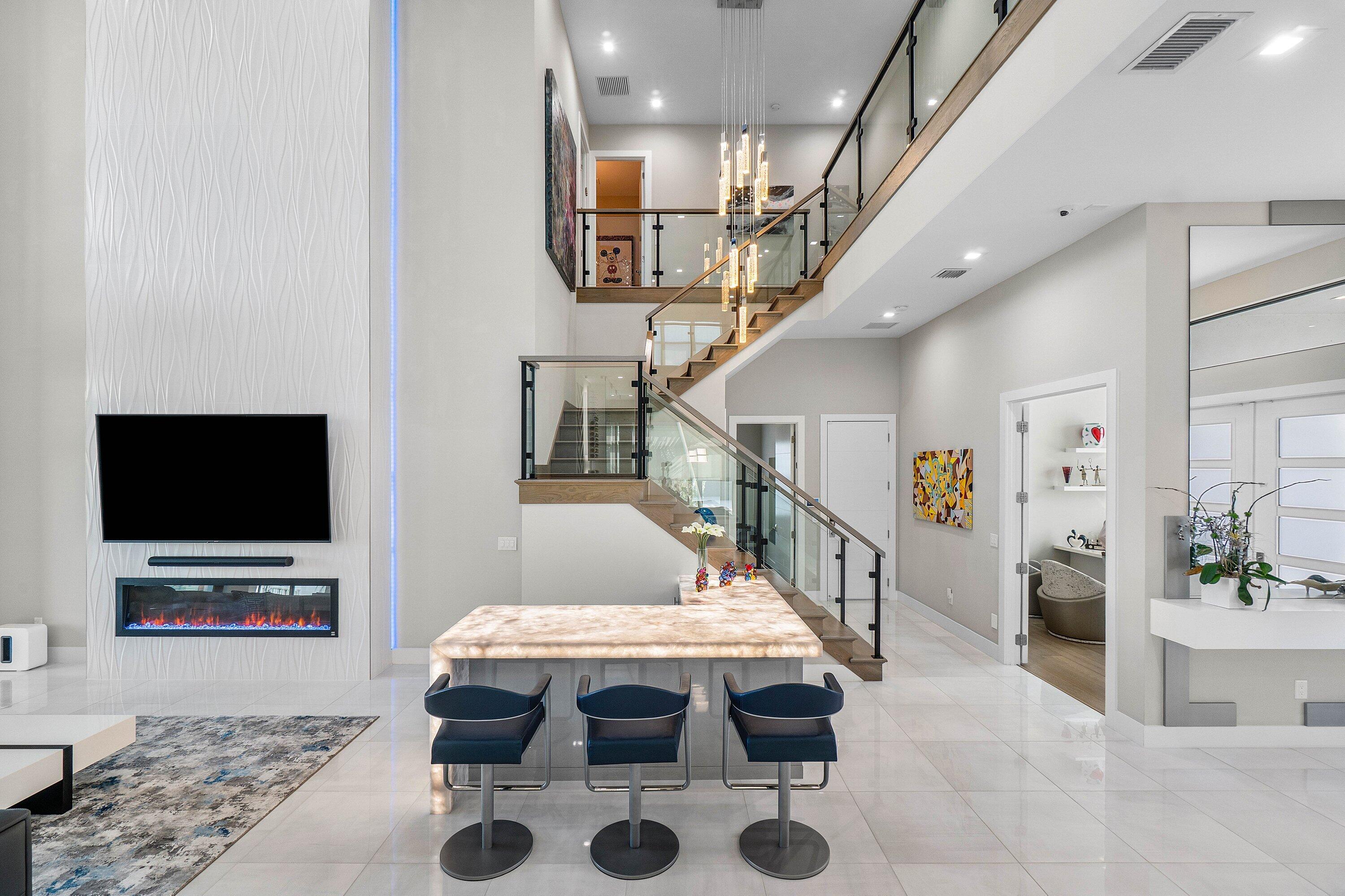 9657 Vescovato Way Boca Raton, FL 33496 - Photo 8 of 68 a living room with furniture and a flat screen tv