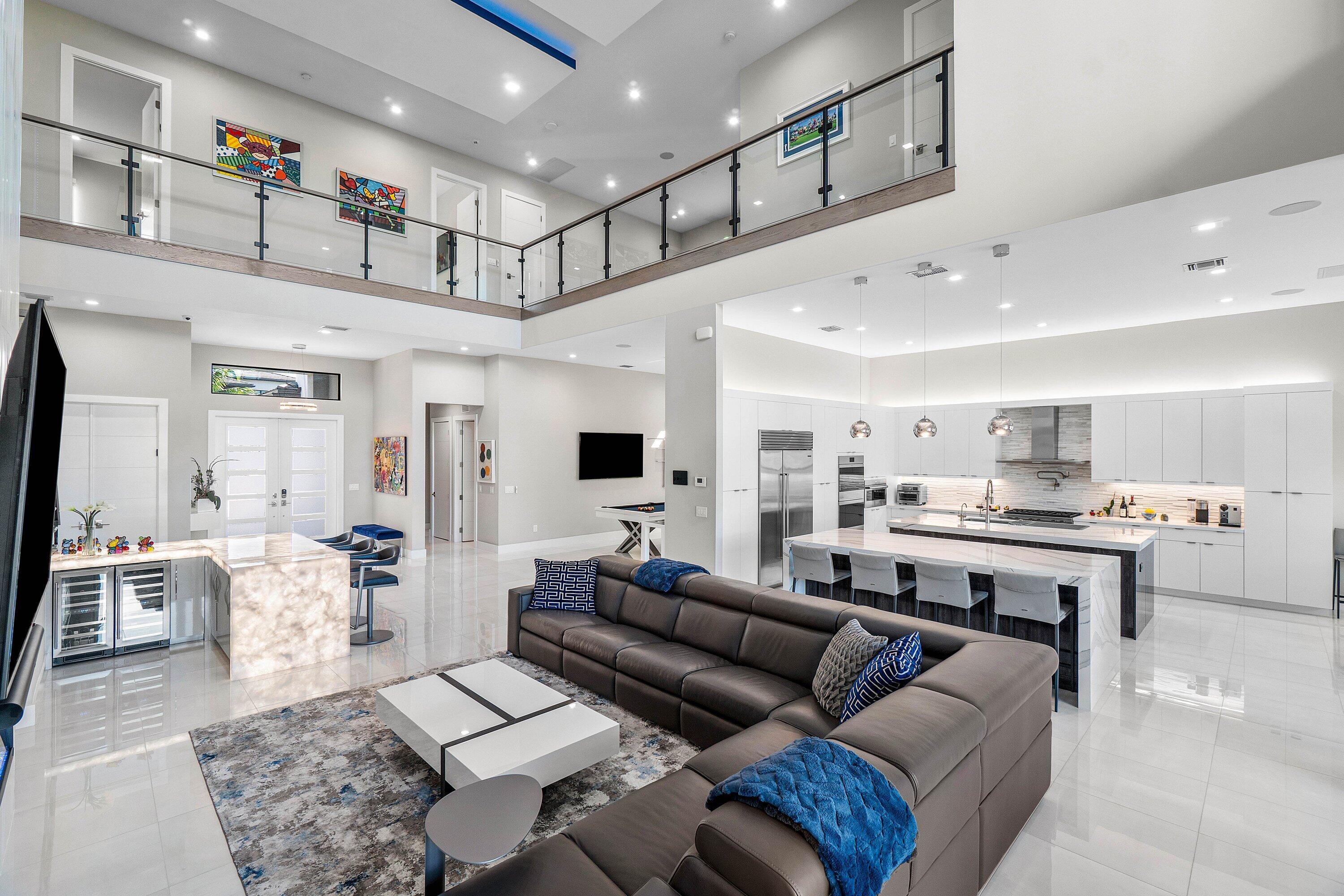 9657 Vescovato Way Boca Raton, FL 33496 - Photo 10 of 68 a living room with furniture kitchen view and a large window