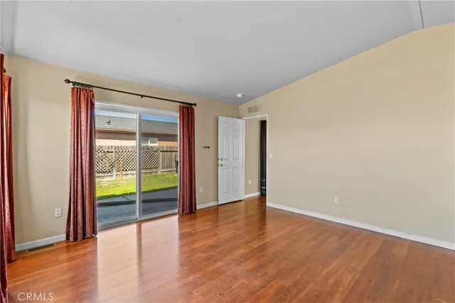 an empty room with an outdoor view