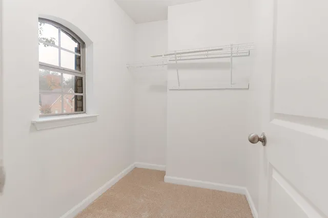 a view of small space with racks on the wall