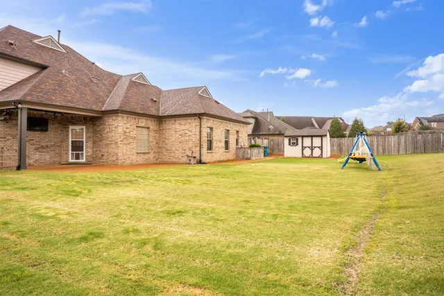 a view of a house with a swimming pool