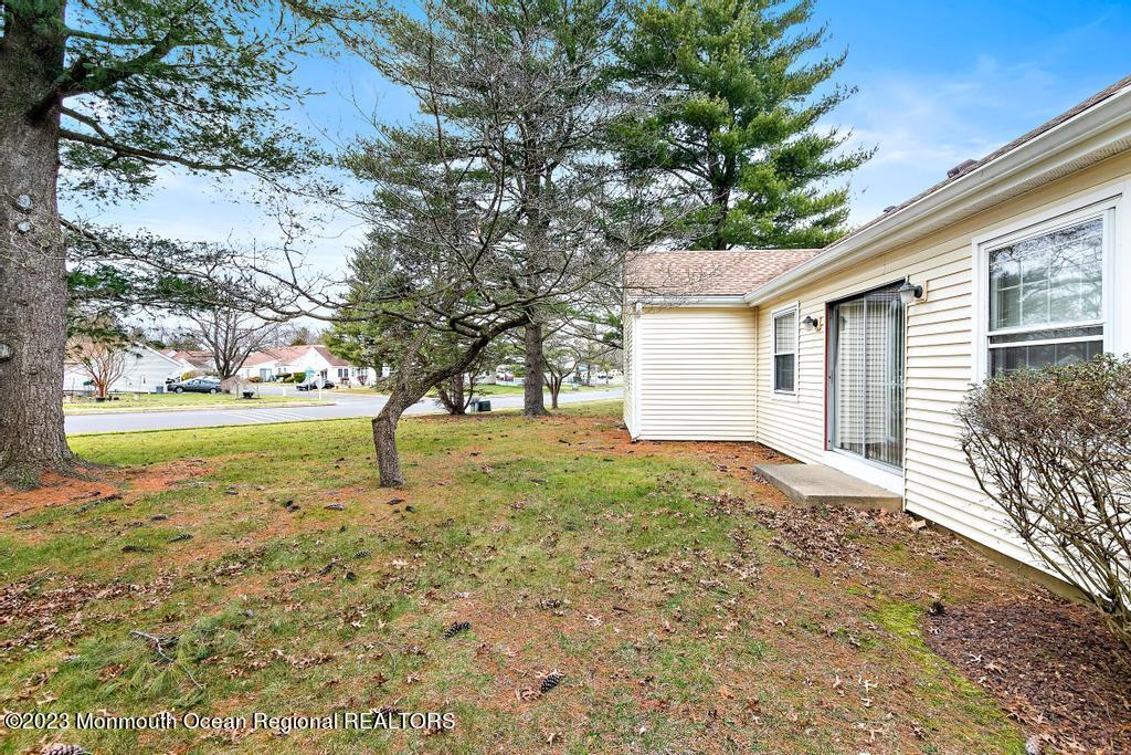 10 B Zacatin Road, Unit B Freehold, NJ 07728 - Photo 10 of 17 a view of backyard of house with green space