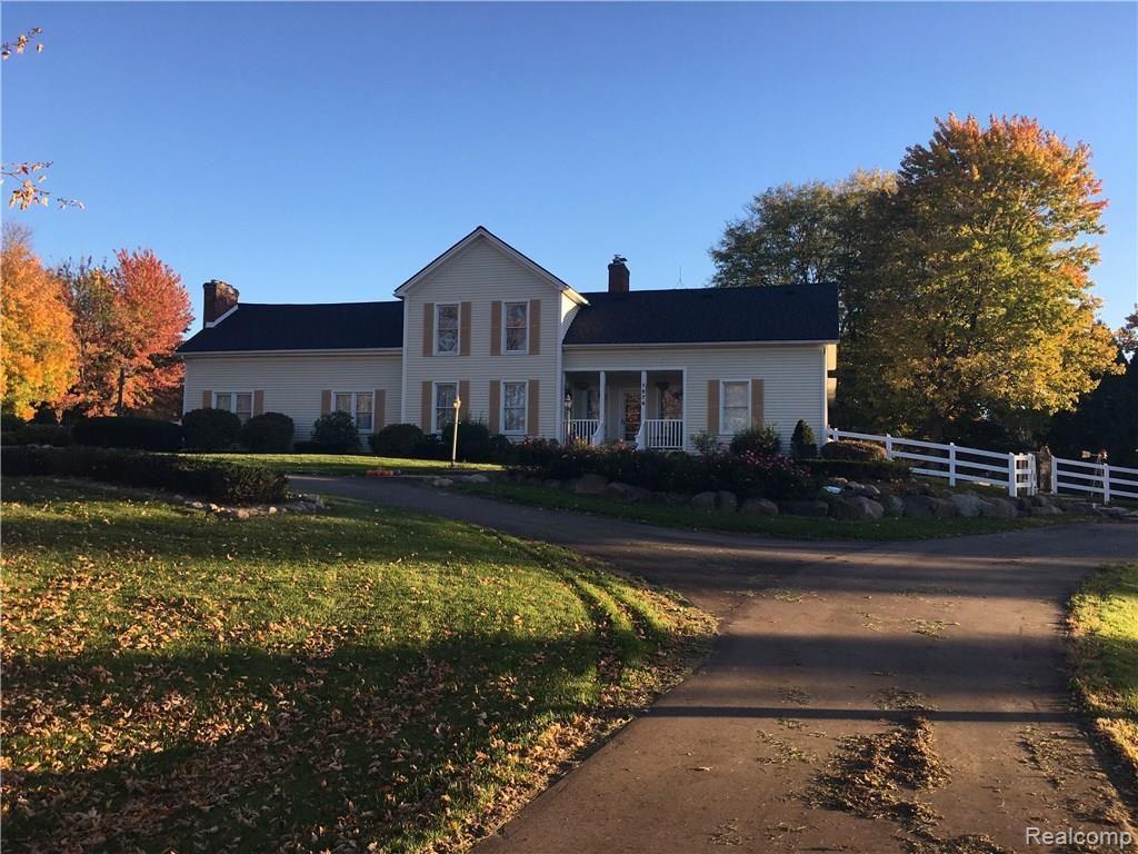 1674 East Romeo Road Oakland, MI 48363 - Photo 52 of 53 Front of house in fall