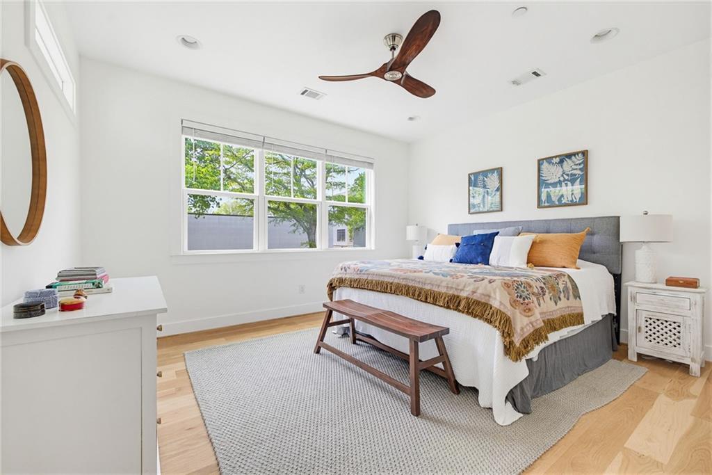 115 South Columbia Drive Decatur, GA 30030 - Photo 17 of 36 a bedroom with a bed and a window