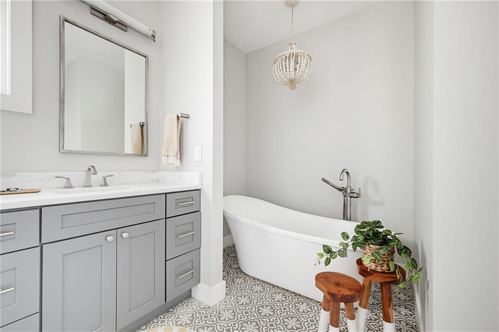 115 South Columbia Drive Decatur, GA 30030 - Photo 20 of 36 a bathroom with a sink and a mirror