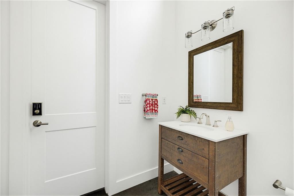 115 South Columbia Drive Decatur, GA 30030 - Photo 28 of 36 a bathroom with a sink vanity and mirror
