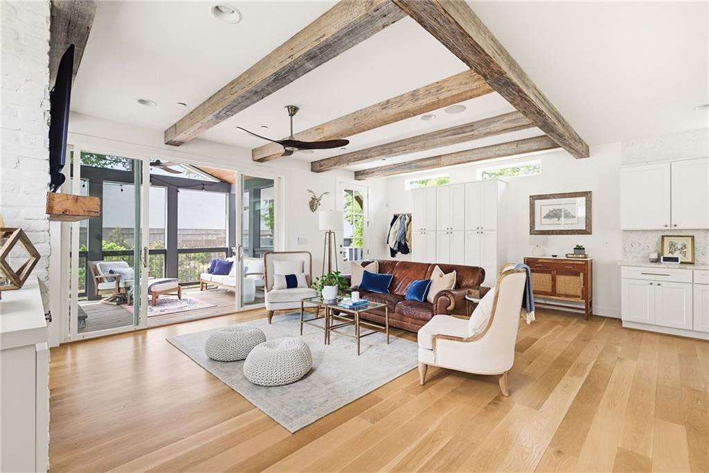 115 South Columbia Drive Decatur, GA 30030 - Photo 9 of 36 a living room with fireplace furniture and a large window