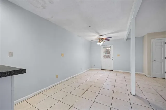 a view of an empty room and window