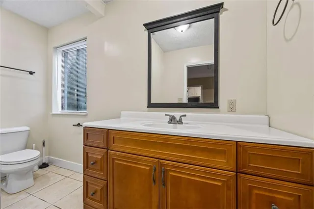 a bathroom with a toilet and a bathtub