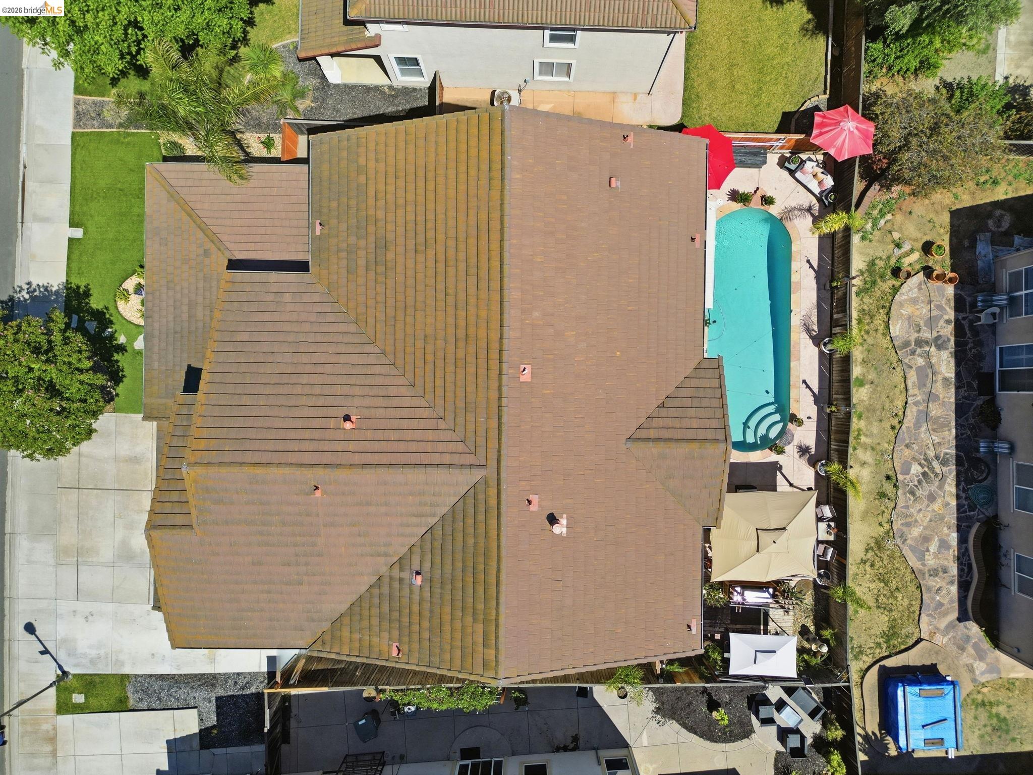 3438 Keystone Loop Discovery Bay, CA 94505 - Photo 57 of 57 Brown tile roof with multiple gables