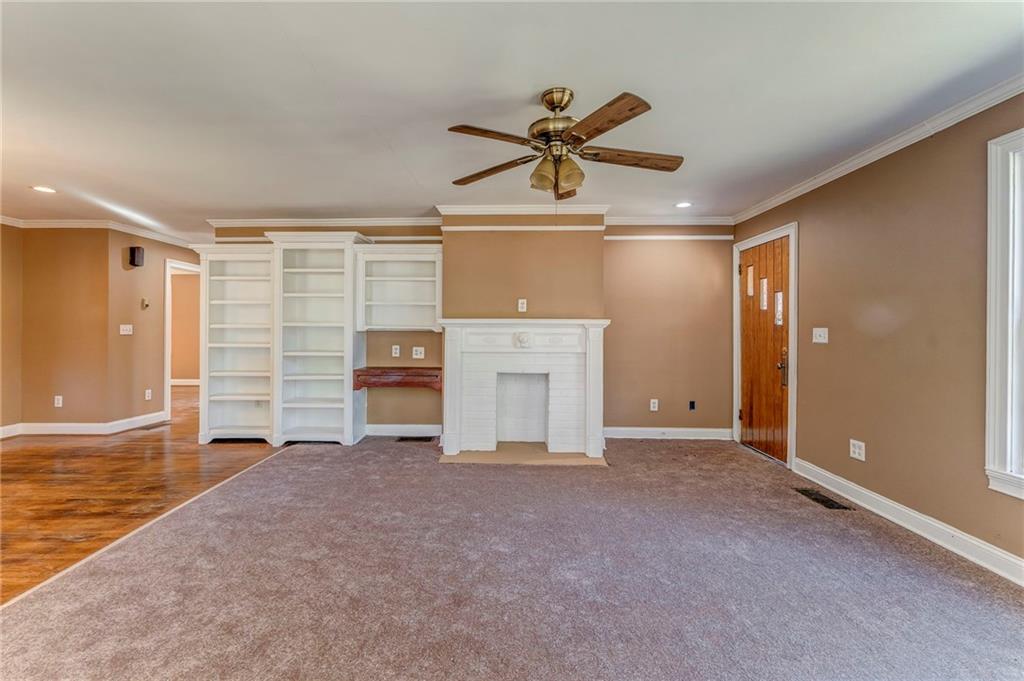 2501 Maple Road Southeast Rome, GA 30161 - Photo 15 of 56 a view of a livingroom with a ceiling fan and window
