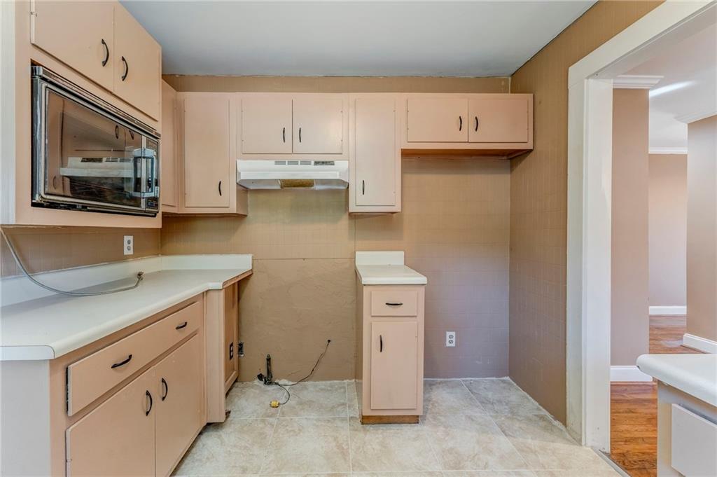 2501 Maple Road Southeast Rome, GA 30161 - Photo 24 of 56 a view of cabinets with wooden floor