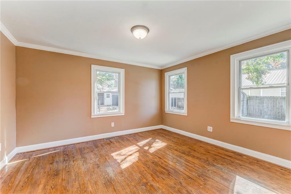 2501 Maple Road Southeast Rome, GA 30161 - Photo 28 of 56 a view of empty room with wooden floor and fan