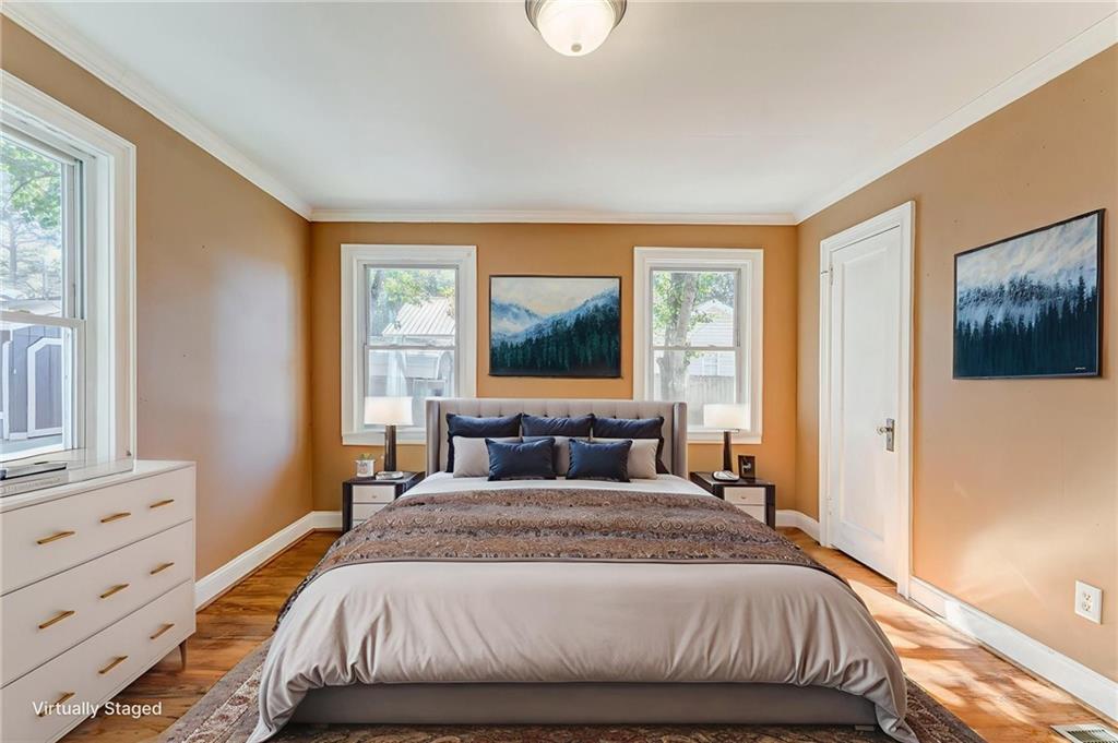 2501 Maple Road Southeast Rome, GA 30161 - Photo 34 of 56 a bedroom with a large bed and a window