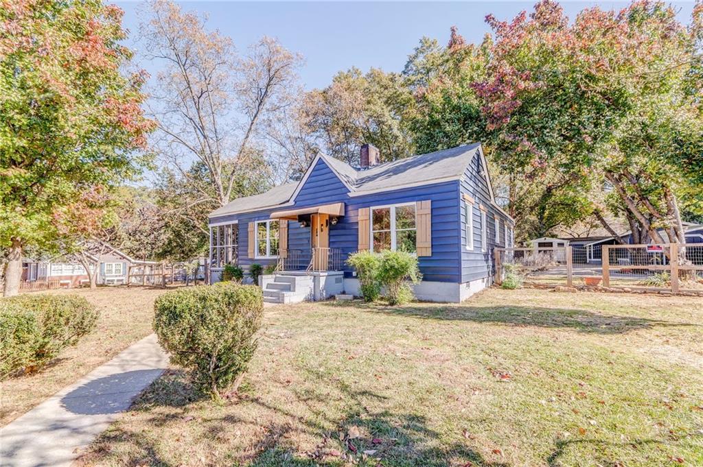 2501 Maple Road Southeast Rome, GA 30161 - Photo 46 of 56 a view of a house with a yard covered in snow