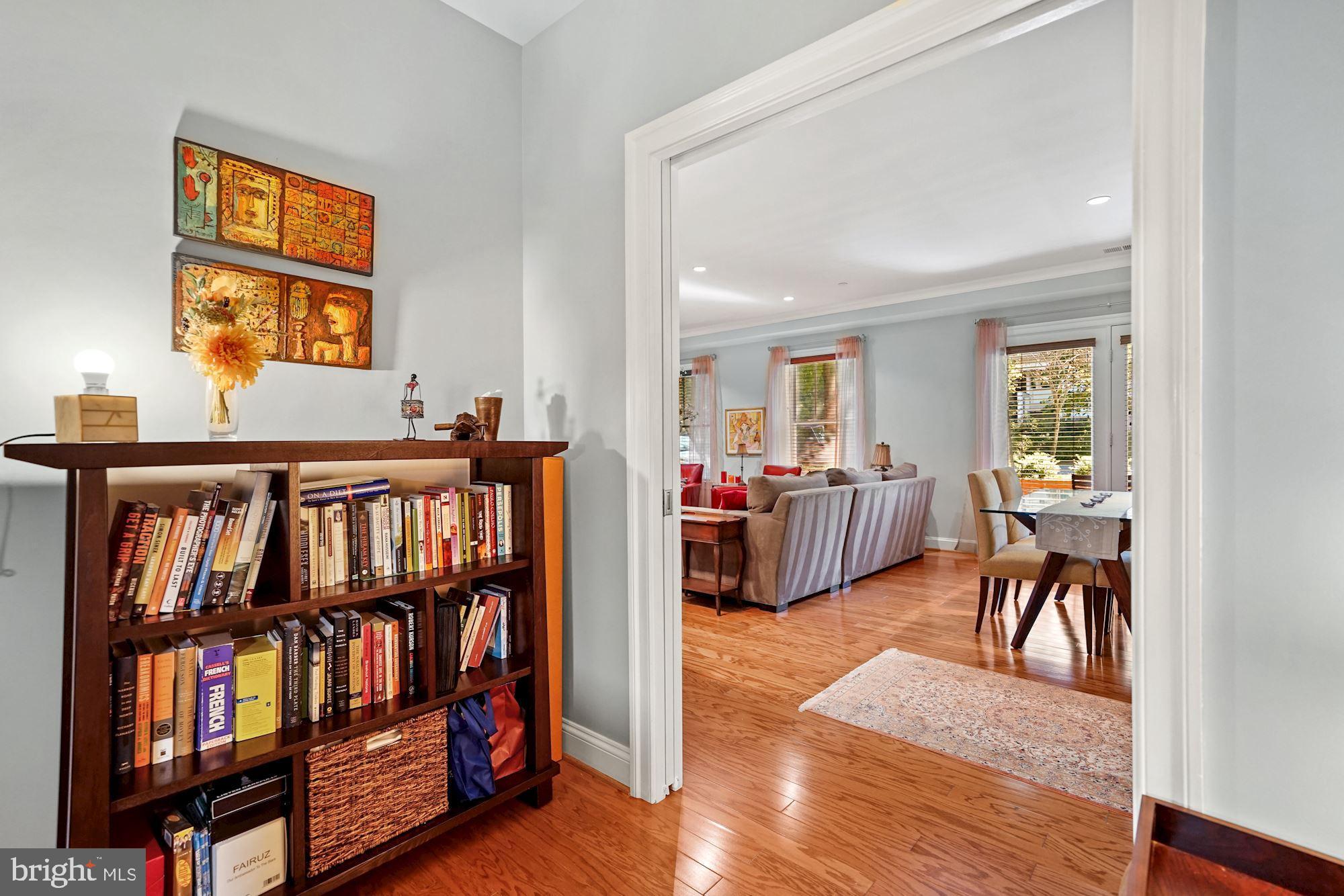 3131 9th Road North, Unit 11 Arlington, VA 22201 - Photo 13 of 39 Den with Pocket Doors