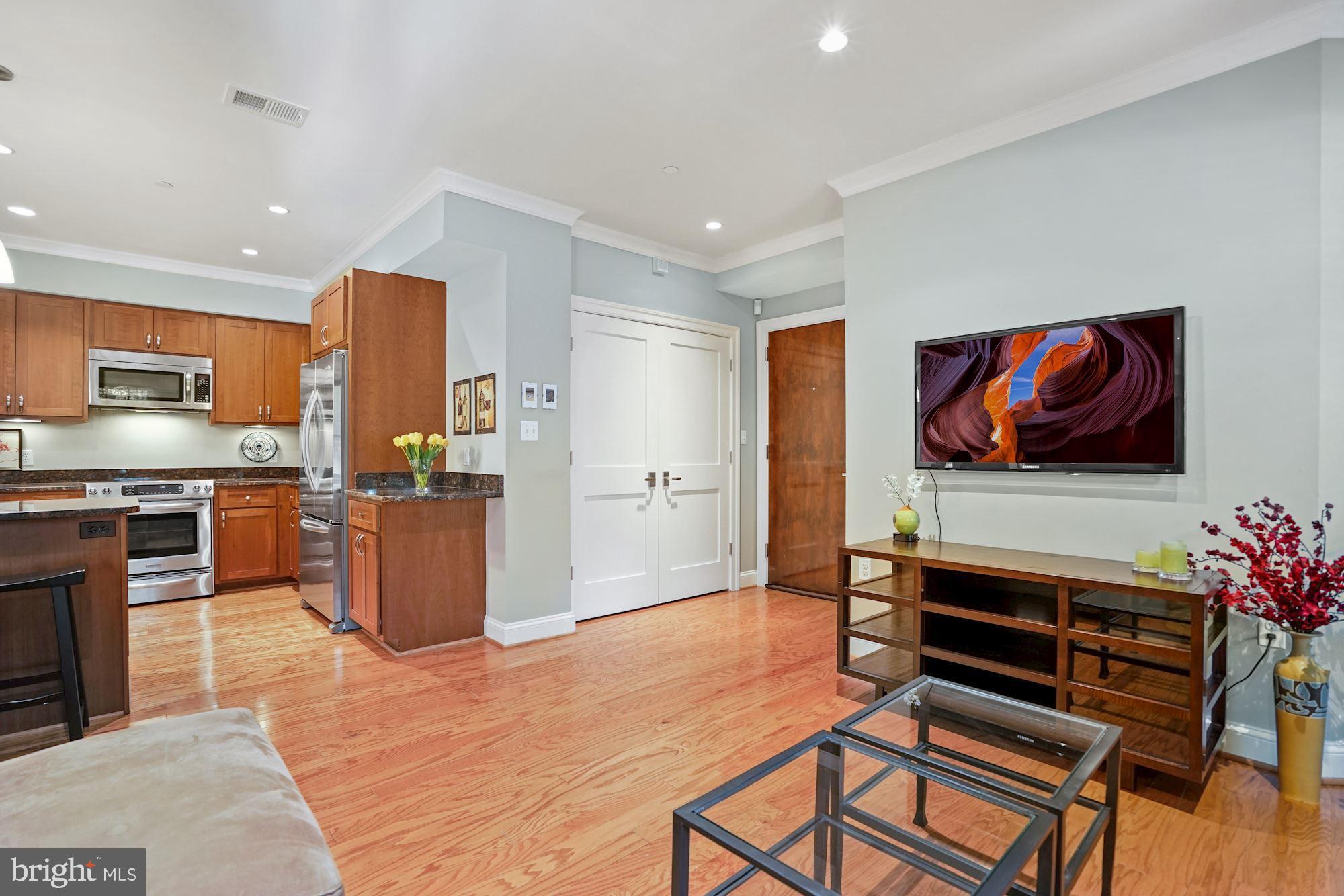 3131 9th Road North, Unit 11 Arlington, VA 22201 - Photo 4 of 39 Living Room Opens to Kitchen