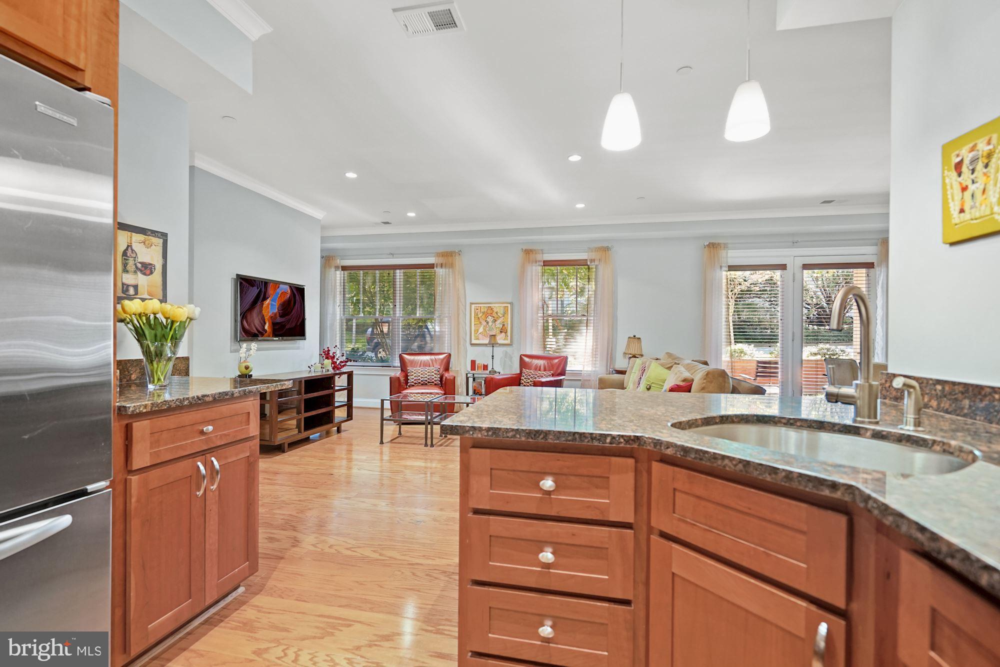 3131 9th Road North, Unit 11 Arlington, VA 22201 - Photo 8 of 39 Kitchen Overlooks the Living Room