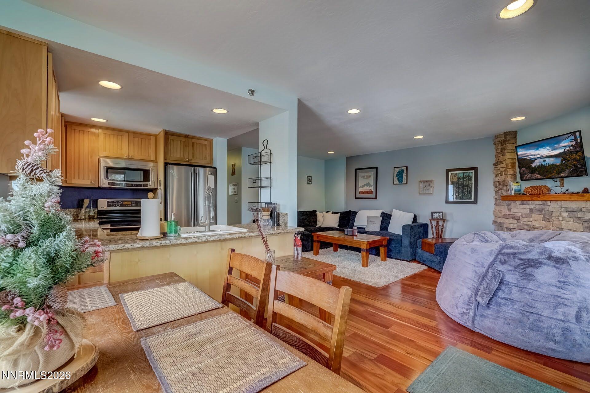 495 Tramway Drive, Unit 7 Stateline, NV 89449 - Photo 10 of 31 a living room with furniture and a flat screen tv