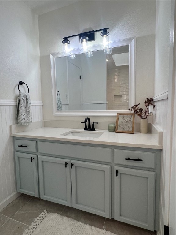 Undisclosed Address Corpus Christi, TX 78418 - Photo 11 of 20 a bathroom with a sink vanity and mirror
