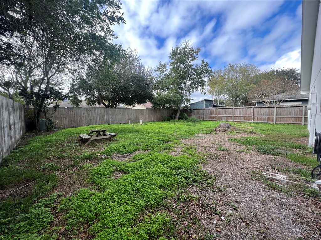 Undisclosed Address Corpus Christi, TX 78418 - Photo 18 of 20 a view of a backyard with large trees