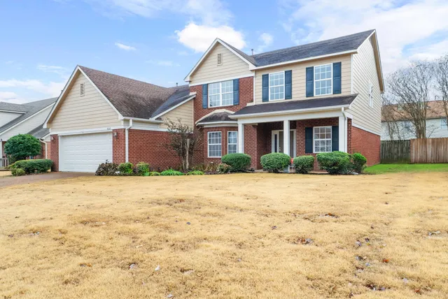 a backyard of a house with lots of green space
