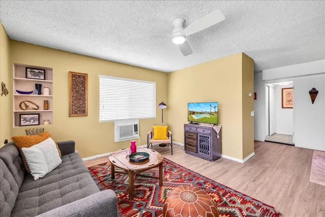a kitchen with a appliances and cabinets