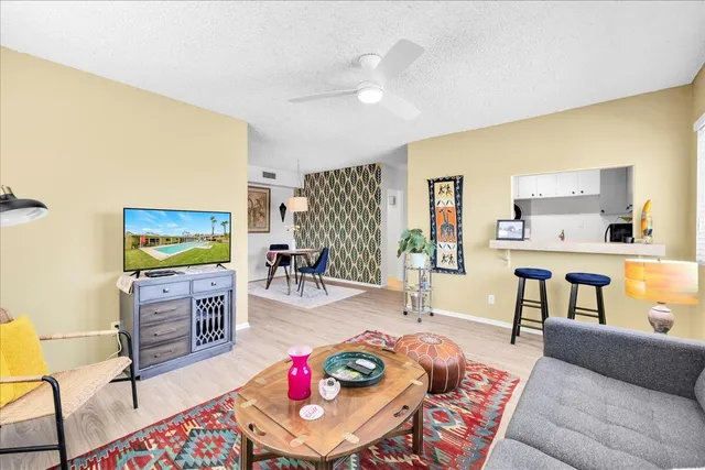 a kitchen with a sink cabinets and appliances