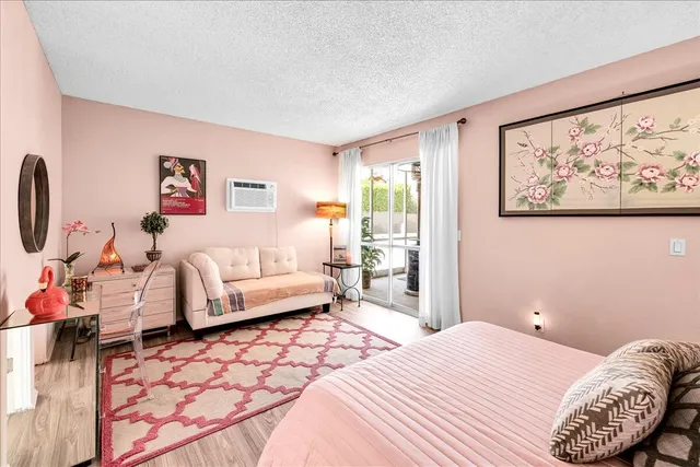 a view of swimming pool with outdoor seating and yard