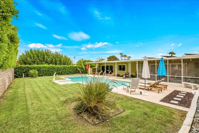 an aerial view of residential building and trees