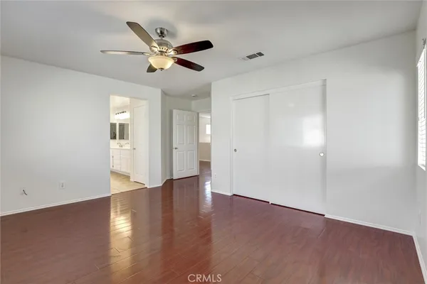 a view of an empty walk in closet