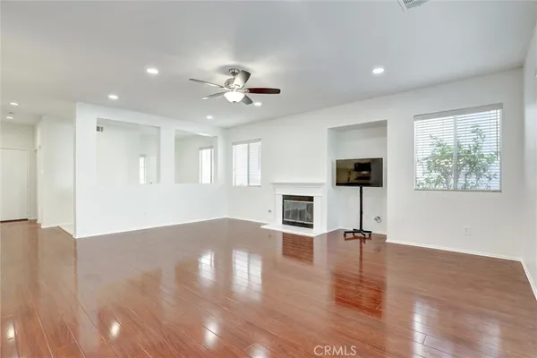 a view of kitchen with furniture and fireplace