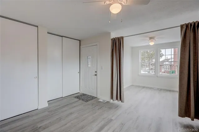 a view of livingroom with hardwood floor and window