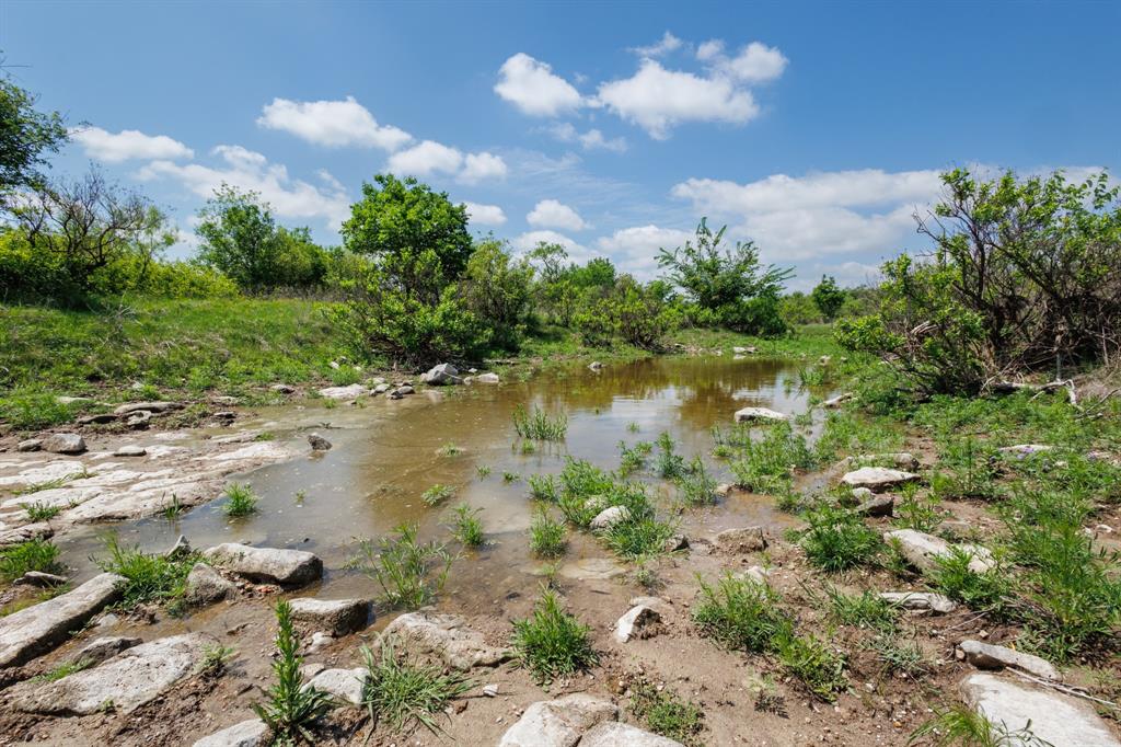 821 P R 4901 Goldsboro, TX 79519 - Photo 8 of 28 a view of a lake with beach