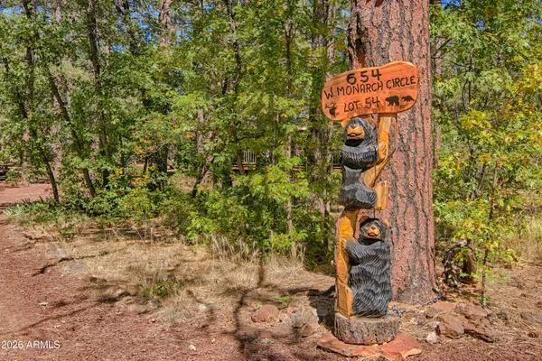 a sign that is on the side of a road