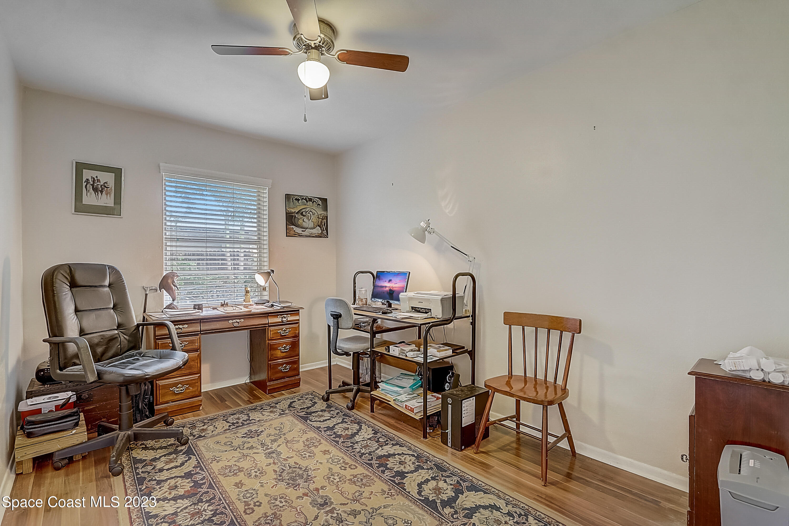 201 Cherry Street Melbourne, FL 32901 - Photo 13 of 22 a work room with furniture