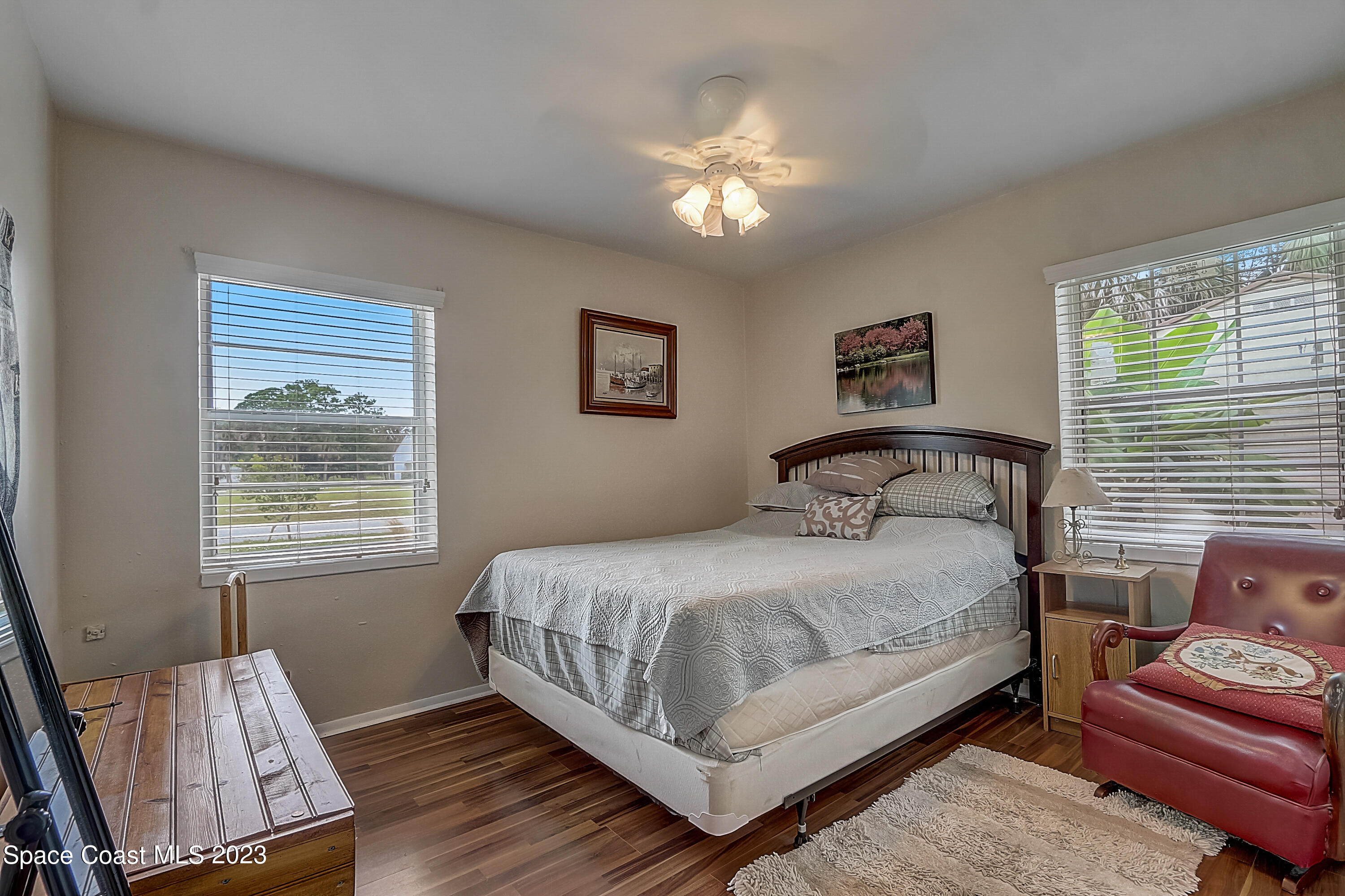 201 Cherry Street Melbourne, FL 32901 - Photo 14 of 22 a bedroom with a bed and window