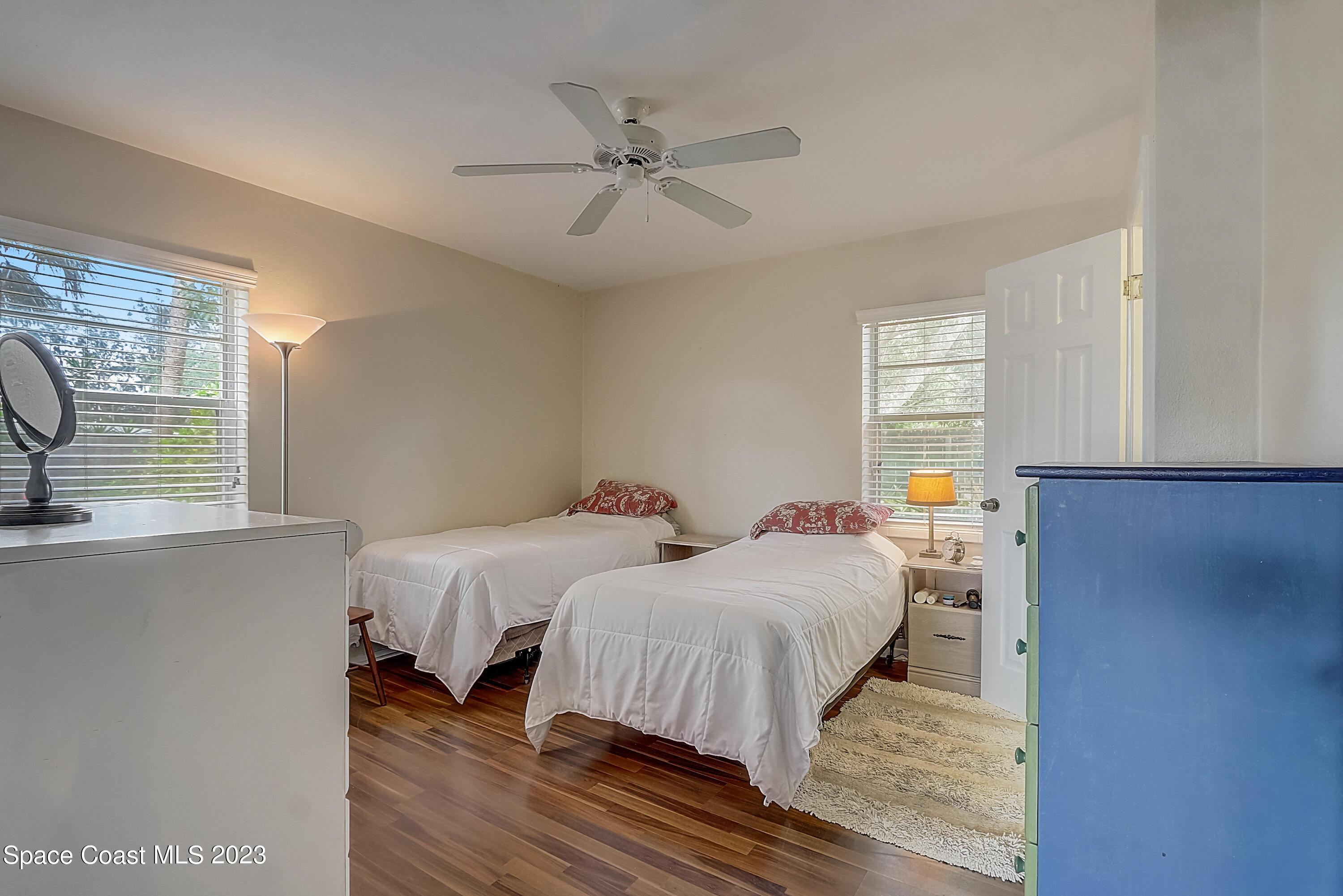 201 Cherry Street Melbourne, FL 32901 - Photo 15 of 22 a bedroom with two beds and a window