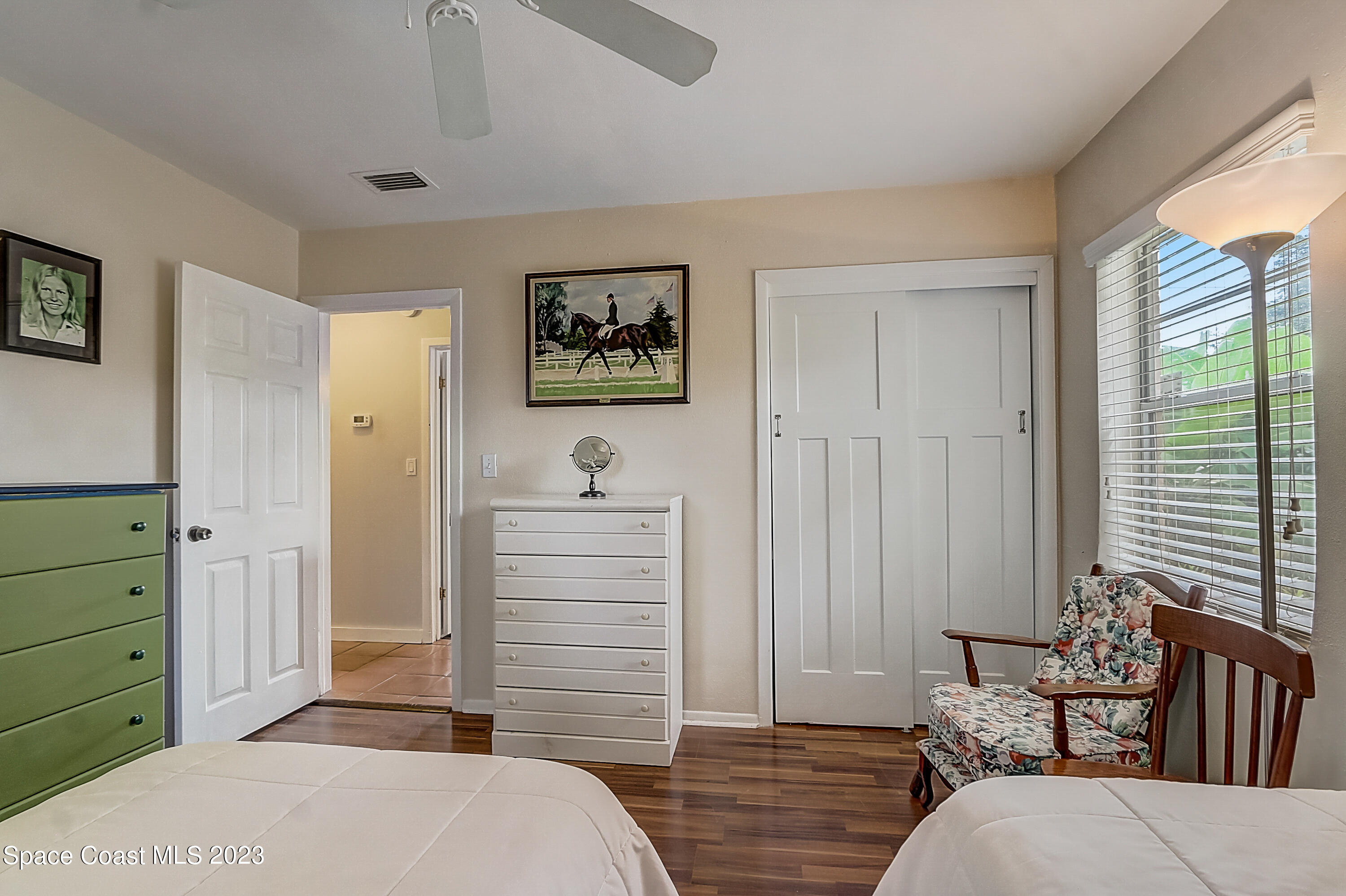 201 Cherry Street Melbourne, FL 32901 - Photo 16 of 22 a bedroom with a bed and furniture