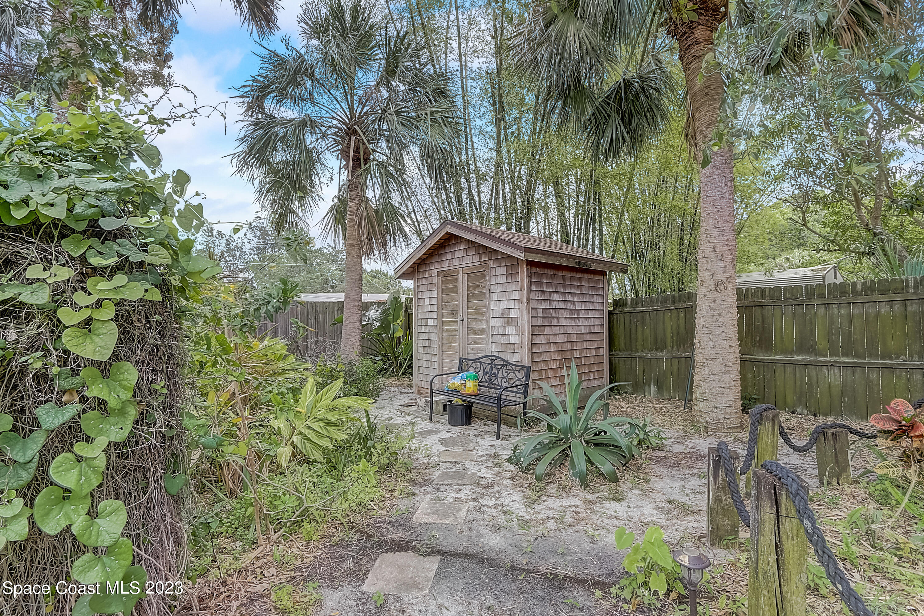 201 Cherry Street Melbourne, FL 32901 - Photo 21 of 22 a backyard of a house with seating space