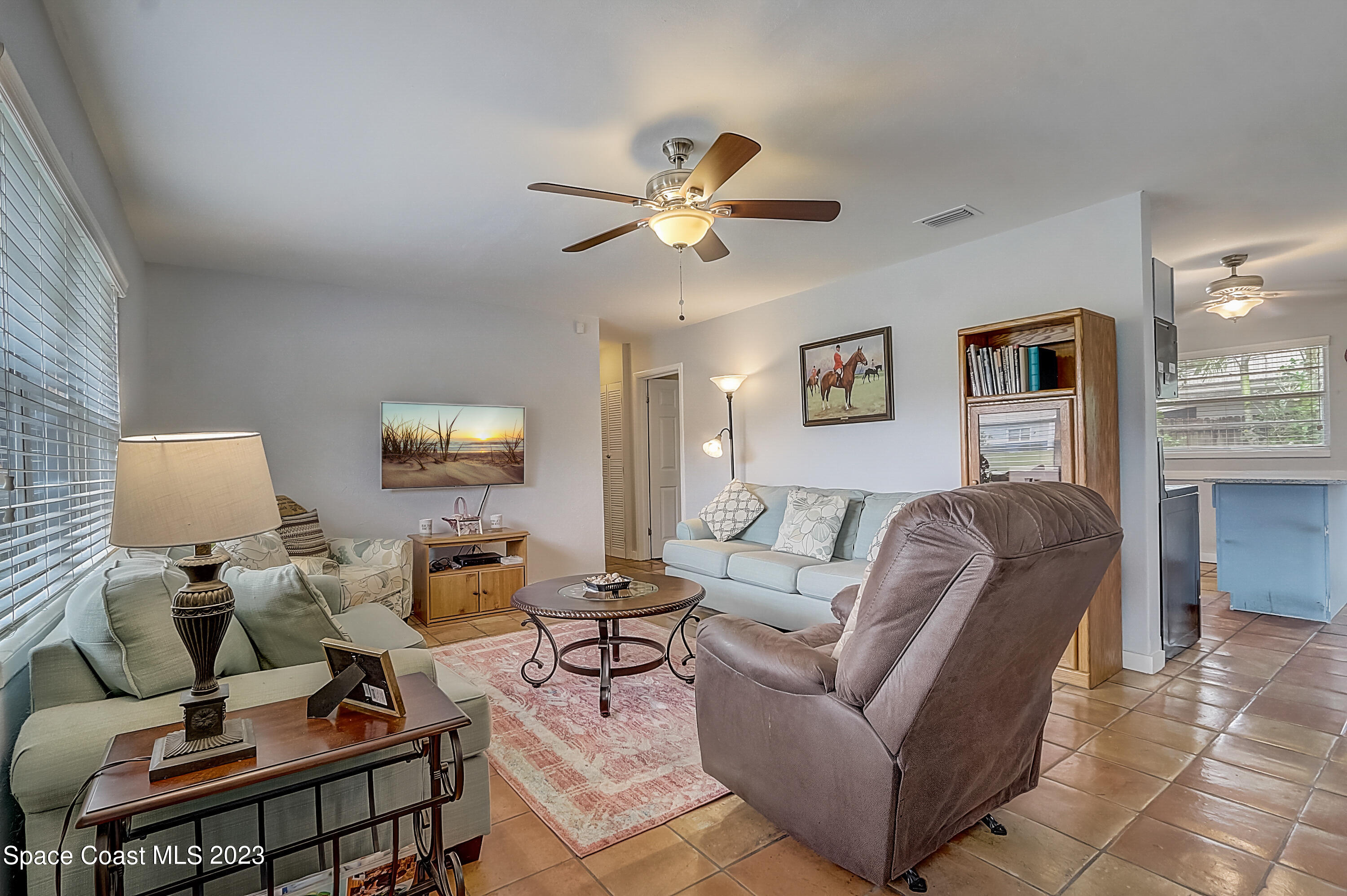201 Cherry Street Melbourne, FL 32901 - Photo 5 of 22 a living room with furniture and a window